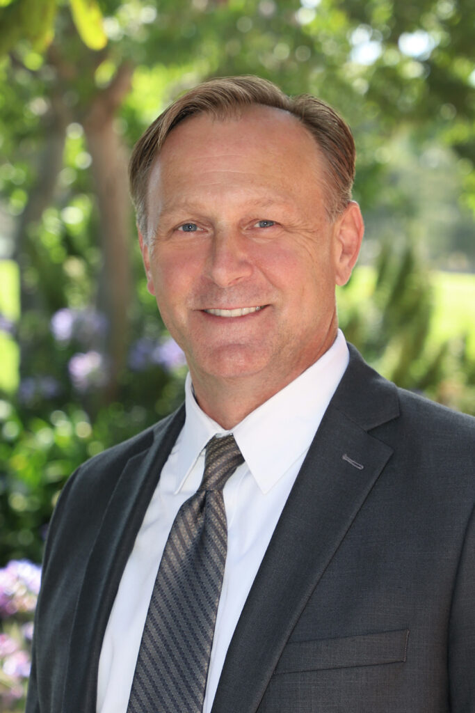 Portrait of a man in a suit and tie, outdoors