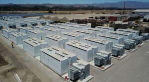 Aerial view of a large battery storage facility with multiple storage units.