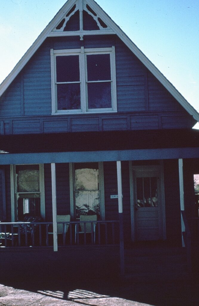 Front view of Haigh/Talley Colony House with porch, taken in 1978.