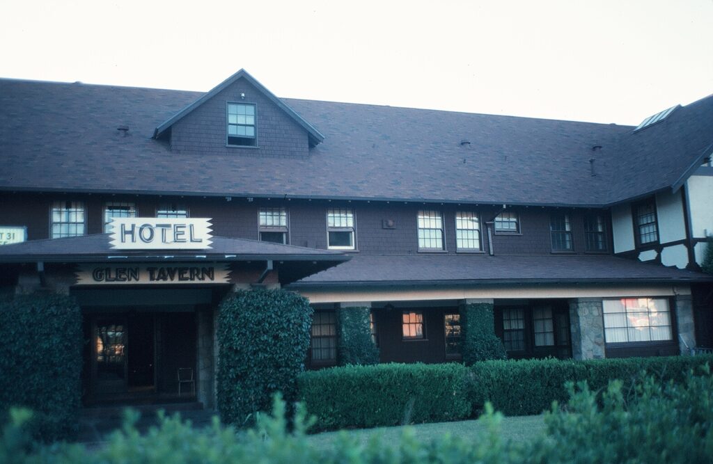Brown brick Glen Tavern Hotel building with "HOTEL GLEN TAVERN" signage, green ivy-covered walls, and a sloped roof, photographed in 1981.