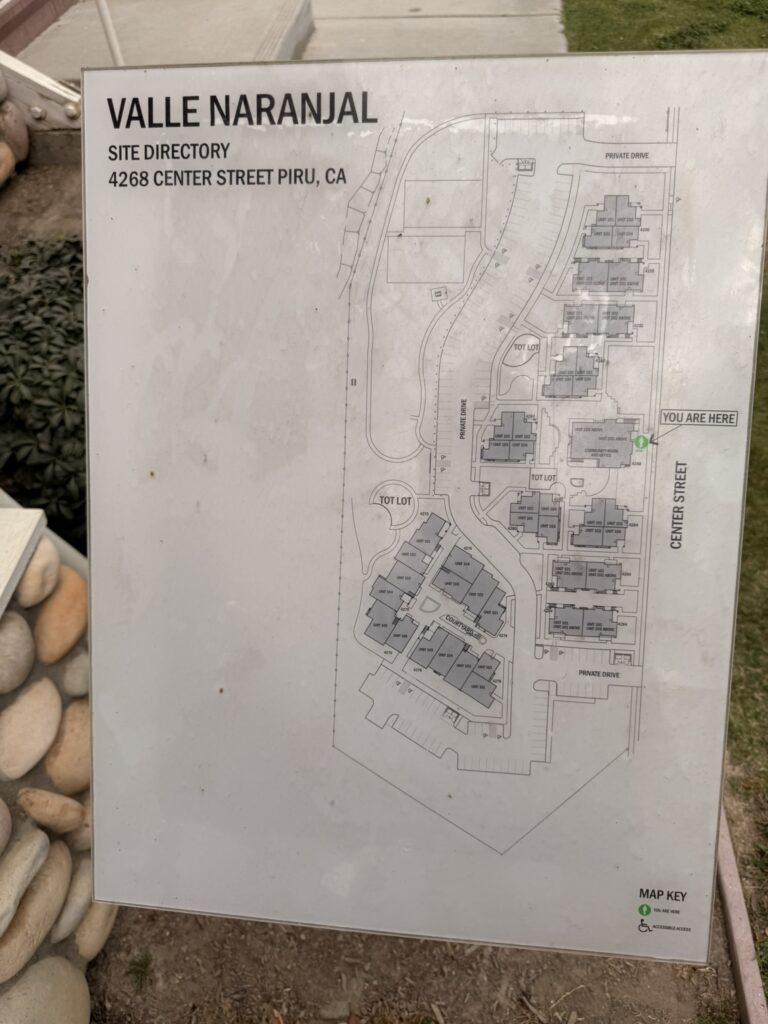 Site directory map for Valle Naranjal apartments, 4268 Center Street, Piru, CA, showing building and unit locations, tot lots, parking, and a "You Are Here" marker.